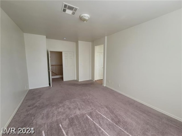 unfurnished bedroom with carpet floors