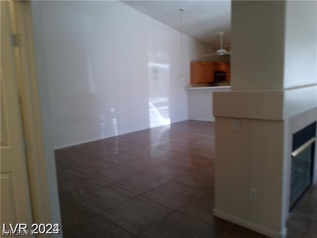 interior space featuring ceiling fan