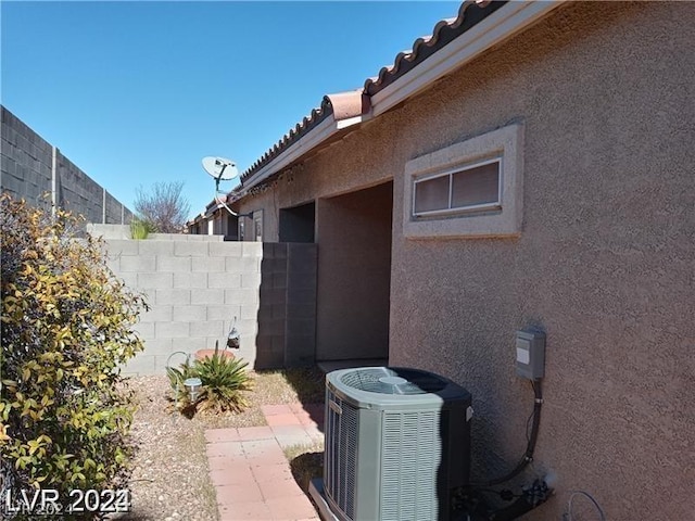 view of home's exterior featuring central AC unit