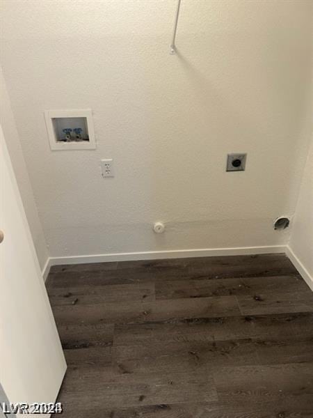 laundry area featuring electric dryer hookup, hookup for a washing machine, and dark hardwood / wood-style floors