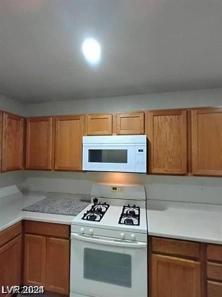 kitchen with white appliances