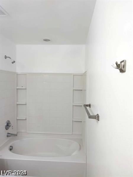 bathroom featuring shower / tub combination