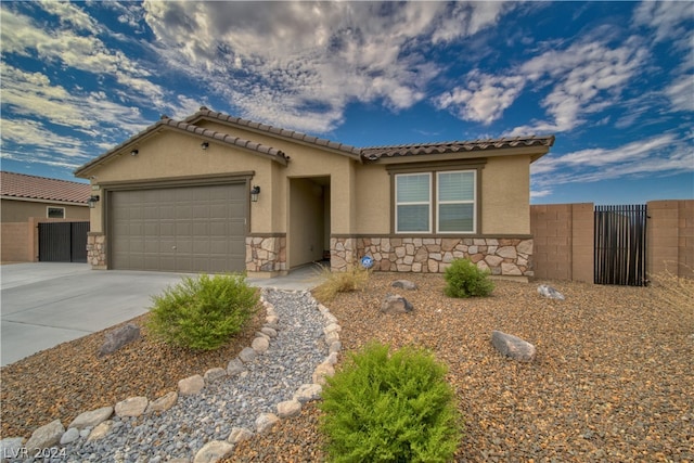 view of front of property with a garage