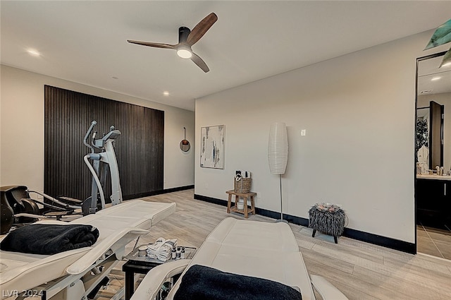 interior space with ceiling fan and light hardwood / wood-style floors