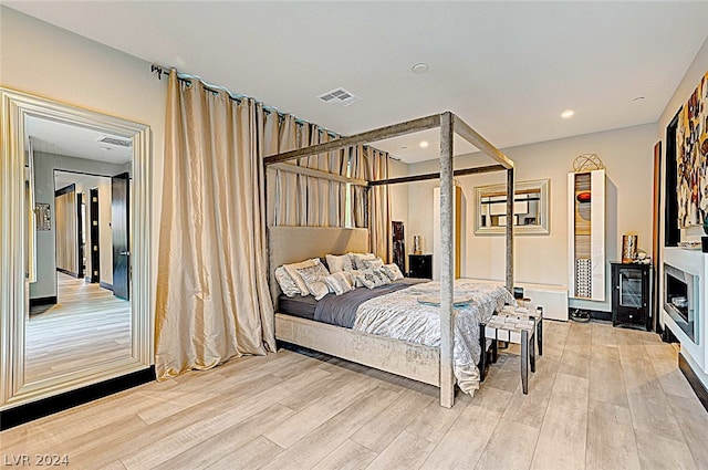 bedroom featuring light wood-type flooring