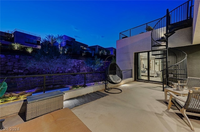 view of patio / terrace with a balcony