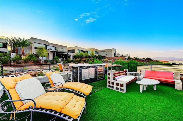 view of yard featuring a balcony