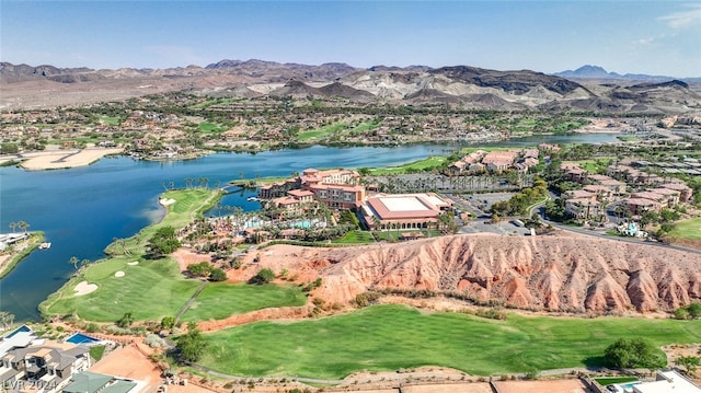 bird's eye view with a water and mountain view