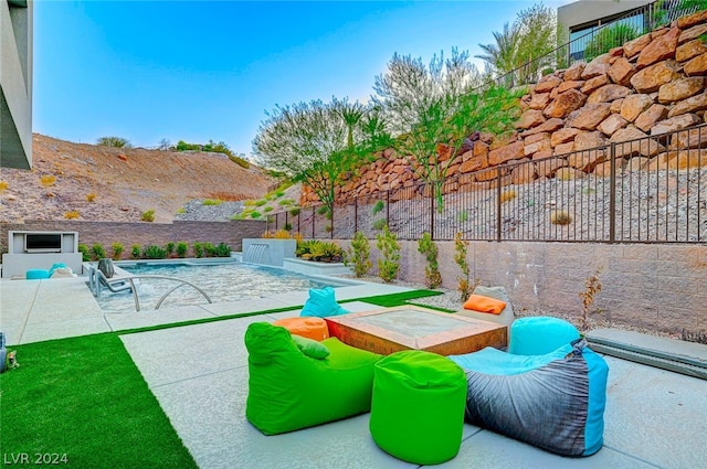 view of swimming pool featuring a patio