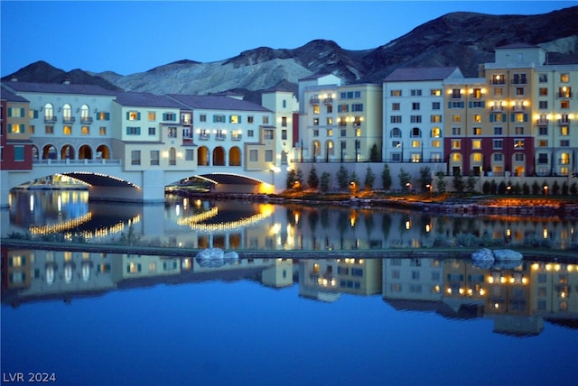 city view featuring a water and mountain view