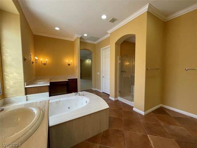 bathroom with plus walk in shower, ornamental molding, tile patterned floors, and dual bowl vanity