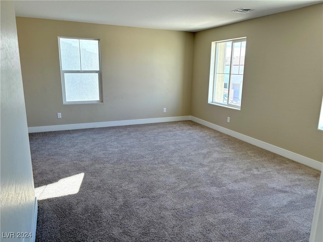 empty room featuring carpet