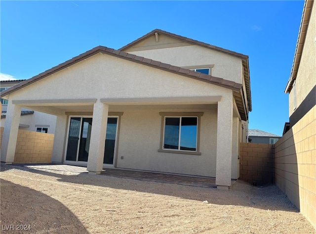 rear view of property with a patio