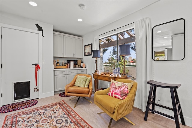 living area featuring light hardwood / wood-style floors