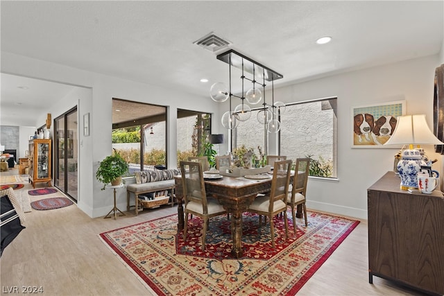 dining room featuring light wood-type flooring