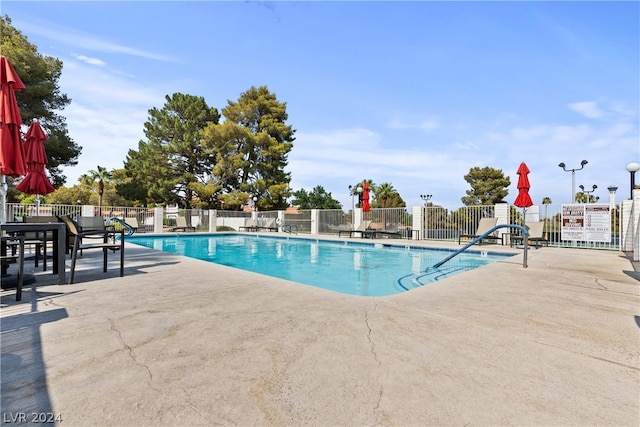 view of pool featuring a patio