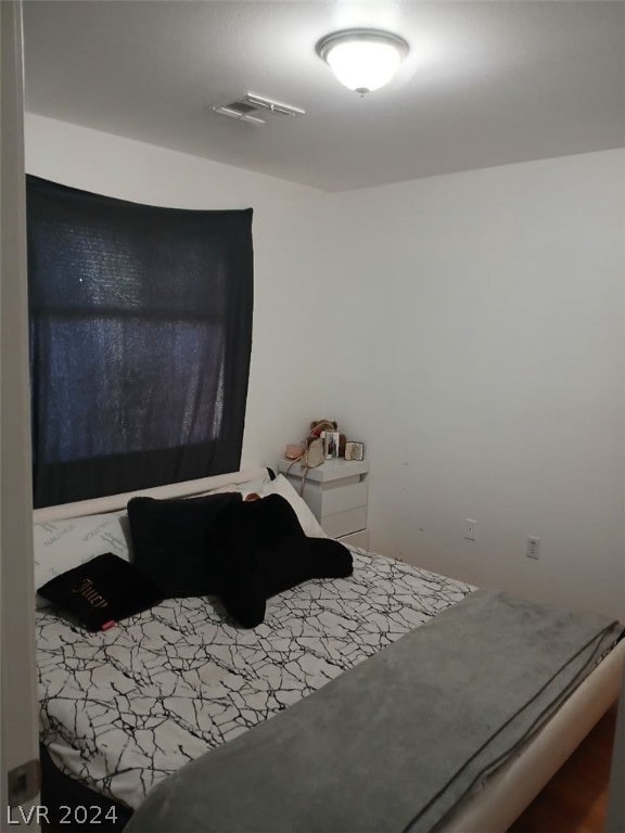 bedroom with visible vents