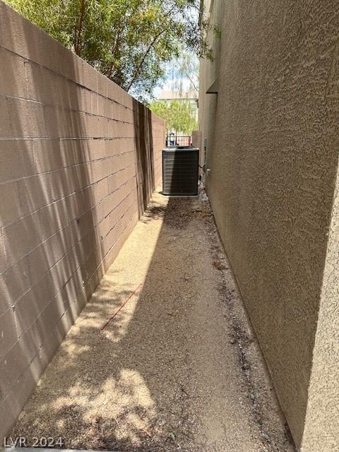 view of side of home with cooling unit