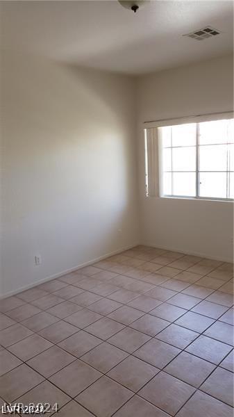 view of tiled empty room