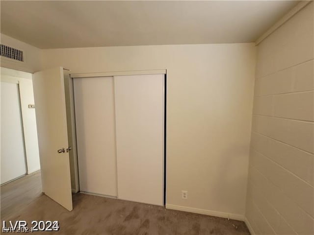 unfurnished bedroom featuring carpet