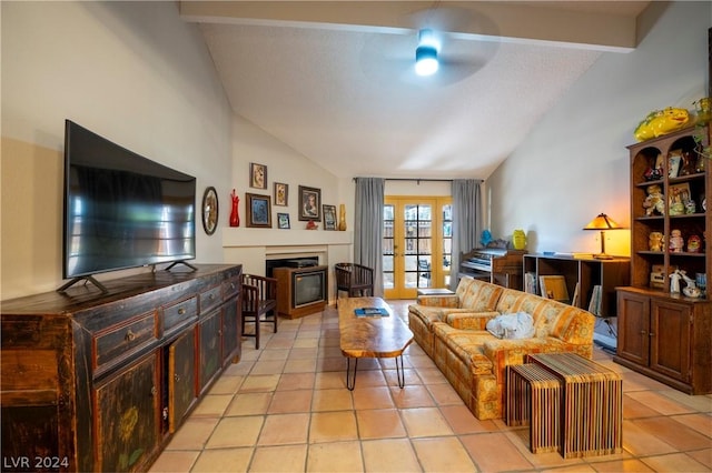 living room featuring a glass covered fireplace, french doors, light tile patterned flooring, and vaulted ceiling with beams