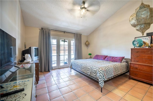 bedroom featuring access to exterior, french doors, light tile patterned flooring, and vaulted ceiling