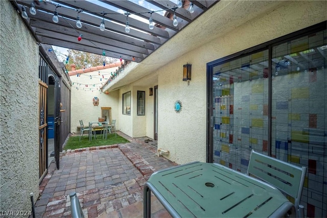 view of patio / terrace featuring outdoor dining area and a pergola