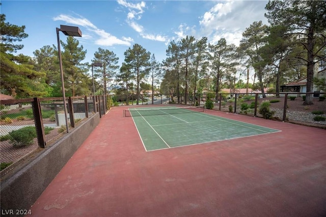 view of sport court with fence