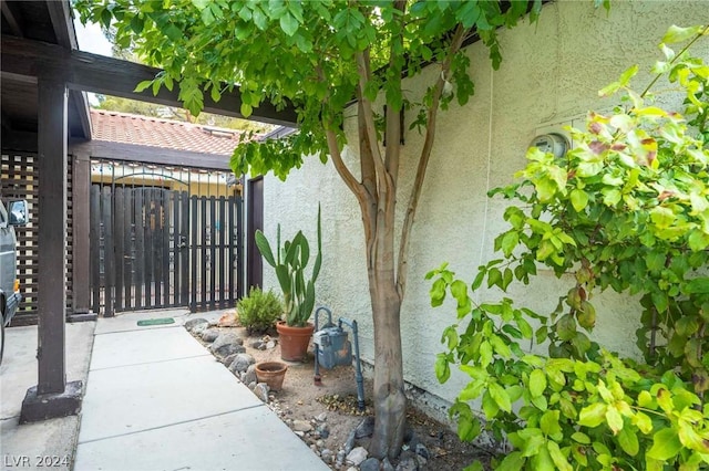 exterior space featuring fence and a gate