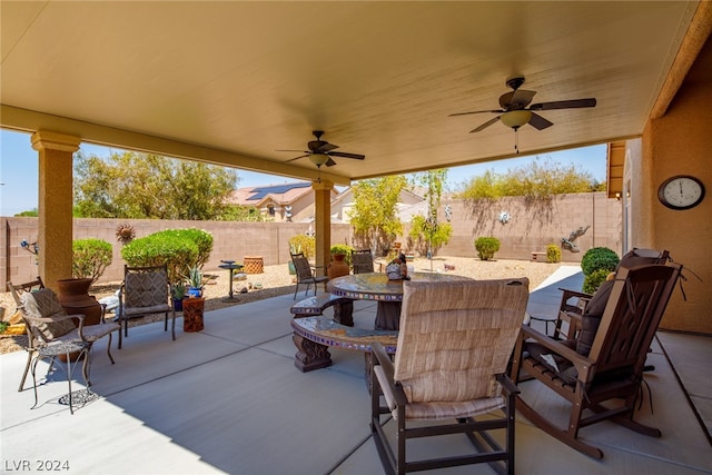 view of patio with ceiling fan