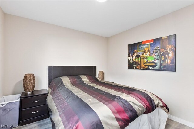 bedroom featuring hardwood / wood-style floors