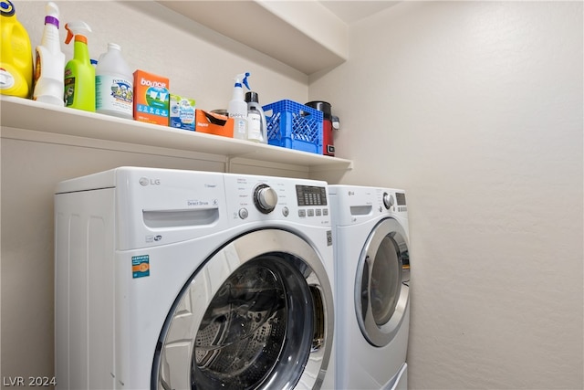 washroom with separate washer and dryer