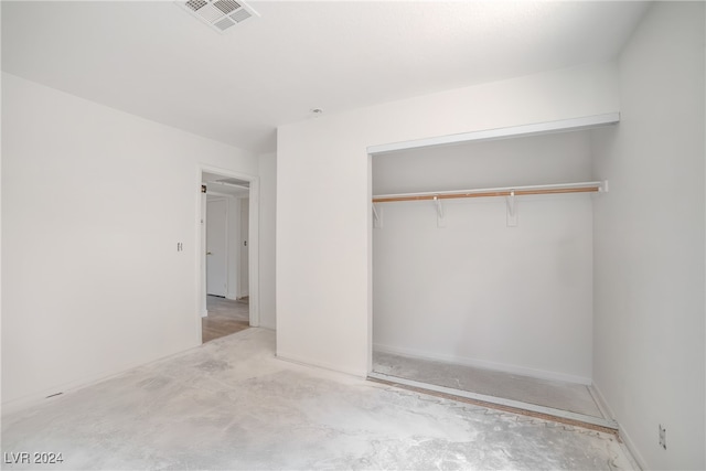 unfurnished bedroom with a closet