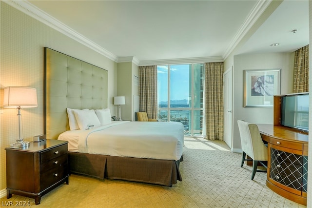 bedroom featuring access to outside and ornamental molding