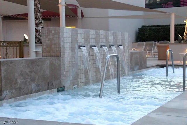 view of snow covered pool