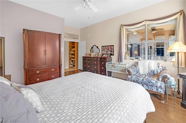 bedroom featuring ceiling fan and light hardwood / wood-style flooring