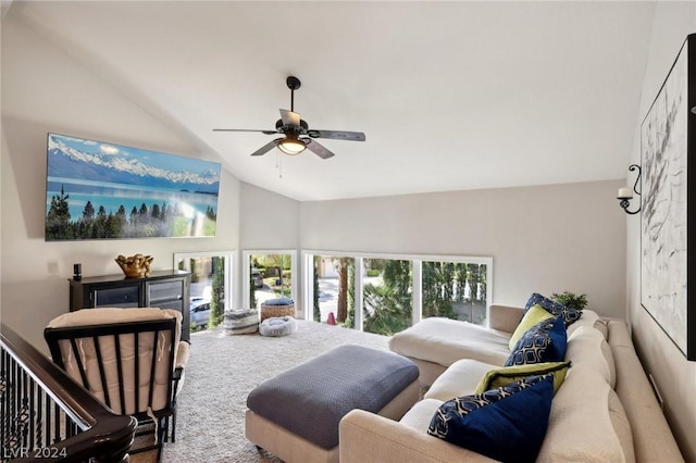 living room featuring carpet flooring, ceiling fan, and high vaulted ceiling