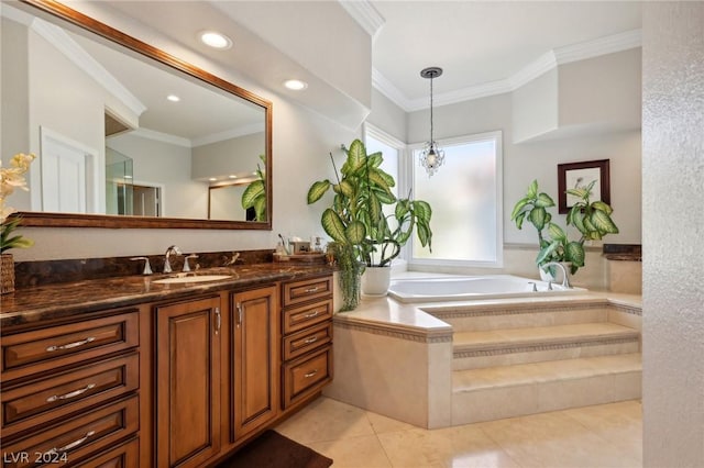 bathroom featuring tile patterned flooring, vanity, tiled bath, and crown molding