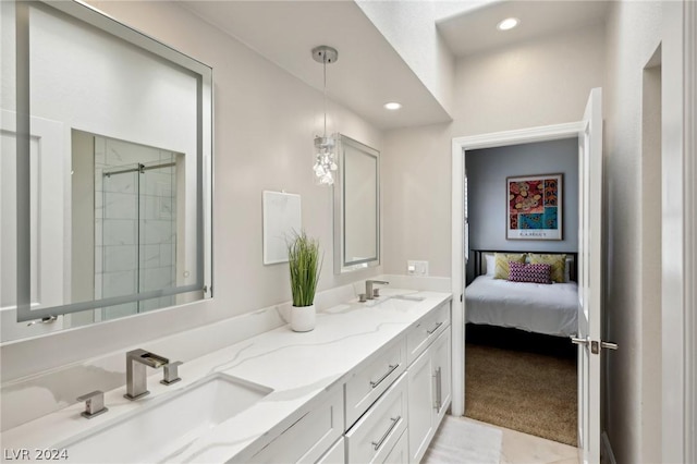 bathroom with vanity and an enclosed shower