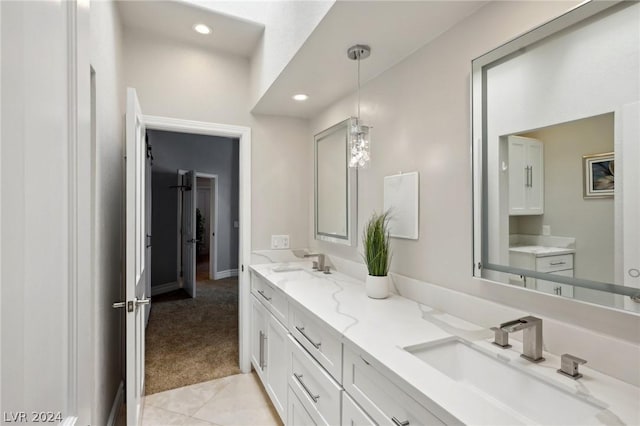 bathroom featuring tile patterned floors and vanity