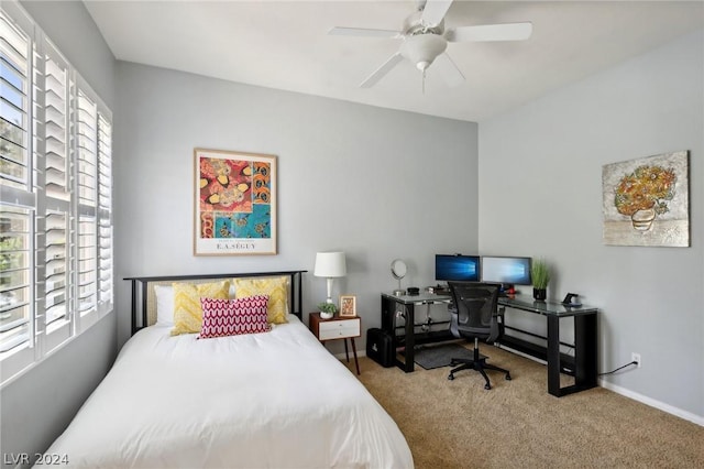 bedroom with ceiling fan and carpet floors