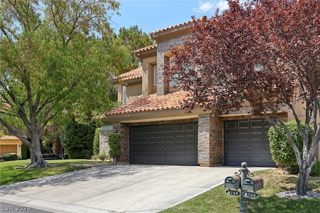 mediterranean / spanish house featuring a garage