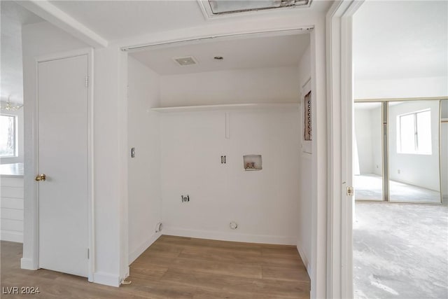 845 Mesquite Springs Dr Unit 101, Mesquite, NV 89027 - laundry room with laundry area, visible vents, wood finished floors, and gas dryer hookup