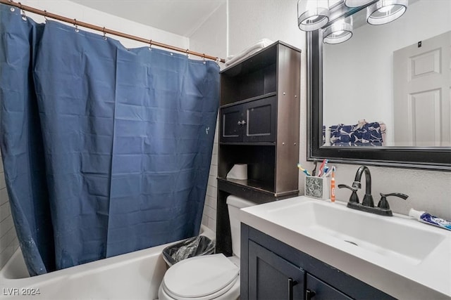 full bathroom featuring vanity, toilet, and shower / tub combo with curtain