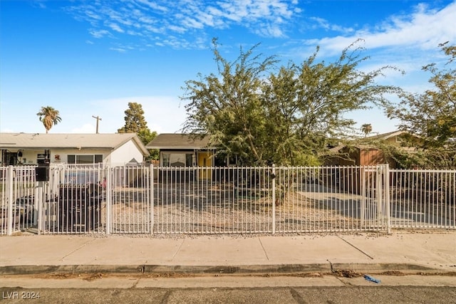 view of property hidden behind natural elements