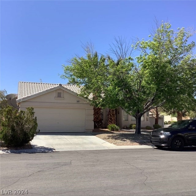 view of front of property with a garage