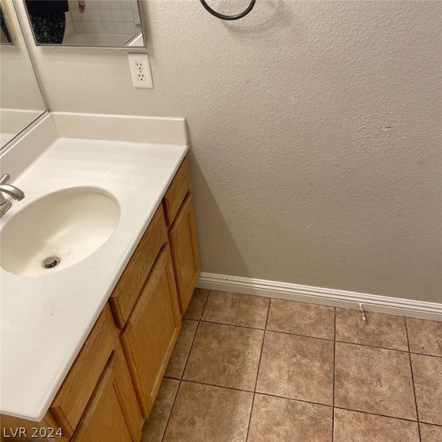 bathroom with vanity and tile patterned floors