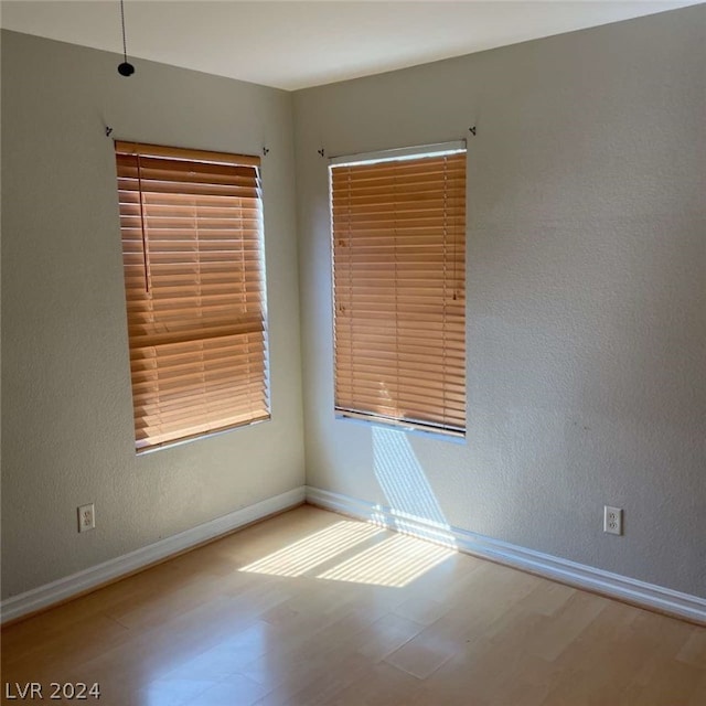 empty room featuring hardwood / wood-style floors