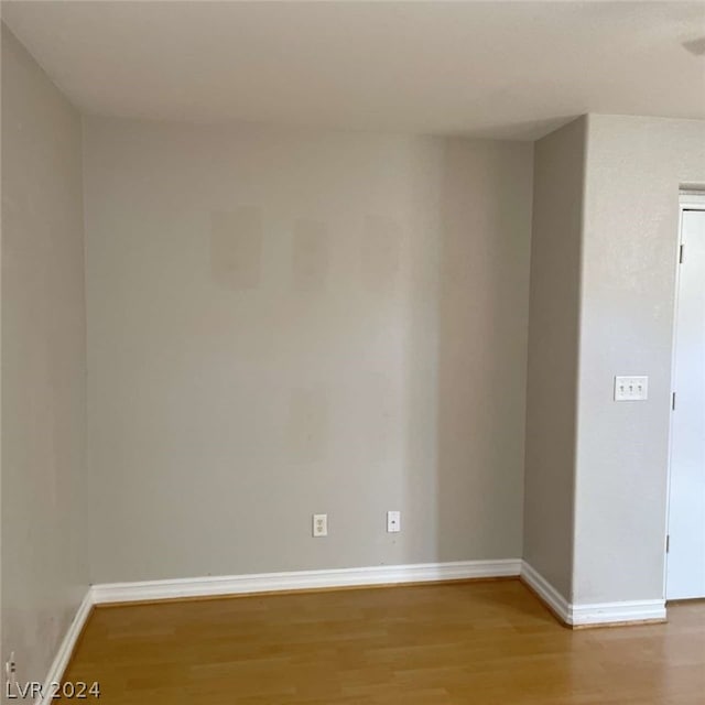 unfurnished room featuring light wood-type flooring