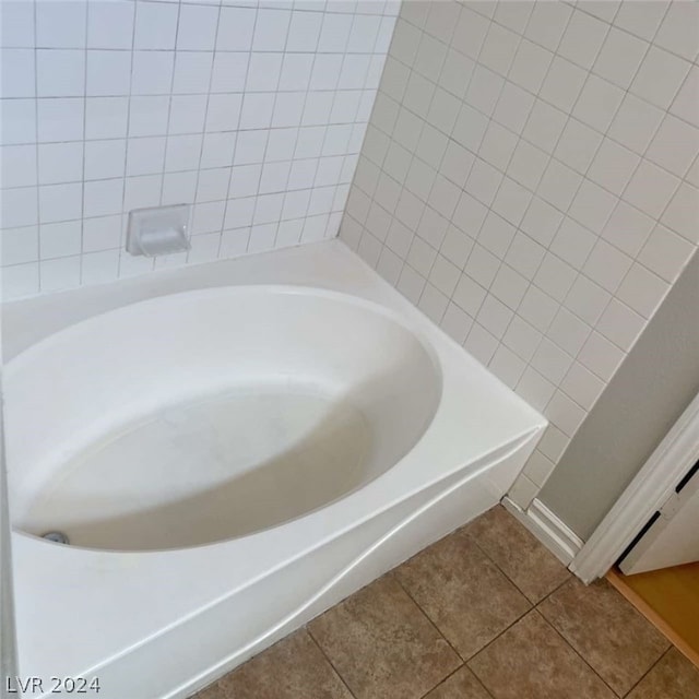 bathroom with tile patterned floors